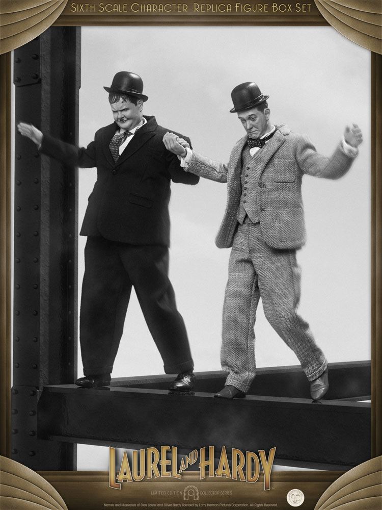Laurel and Hardy Figurine climbing a wall – Badgers Auctions | On-site Laurel and Hardy Figurine climbing a wall – Badgers Auctions | On-site
